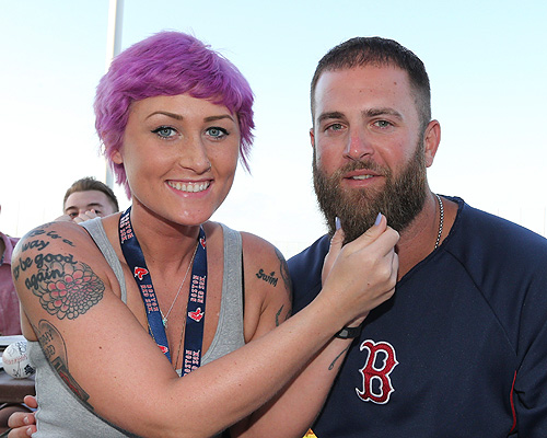 Mike Napoli with a patient at spring training