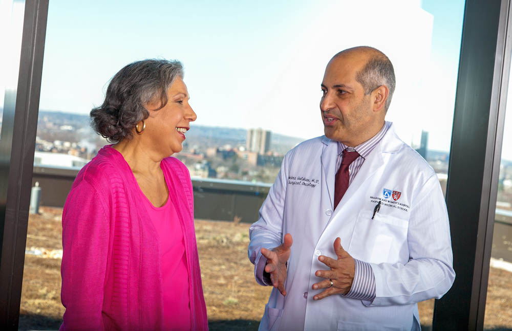 Mehra Golshan, MD, director of Breast Surgical Services with the Susan F. Smith Center for Women's Cancers at Dana-Farber, speaks with a patient.