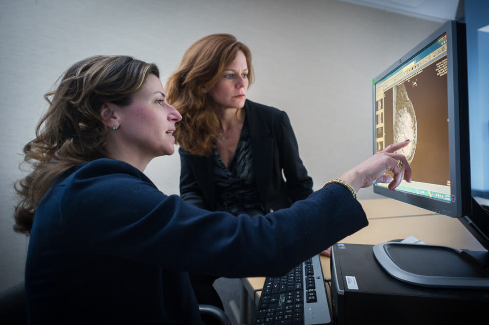 Dana-Farber breast cancer experts Ann Partridge, MD, MPH, and Tari King, MD, discuss results from a breast cancer scan.