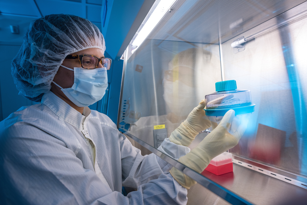 A technician helps prepare CAR T cells at Dana-Farber's Connell and O'Reilly Families Cell Manipulation Core Facility.