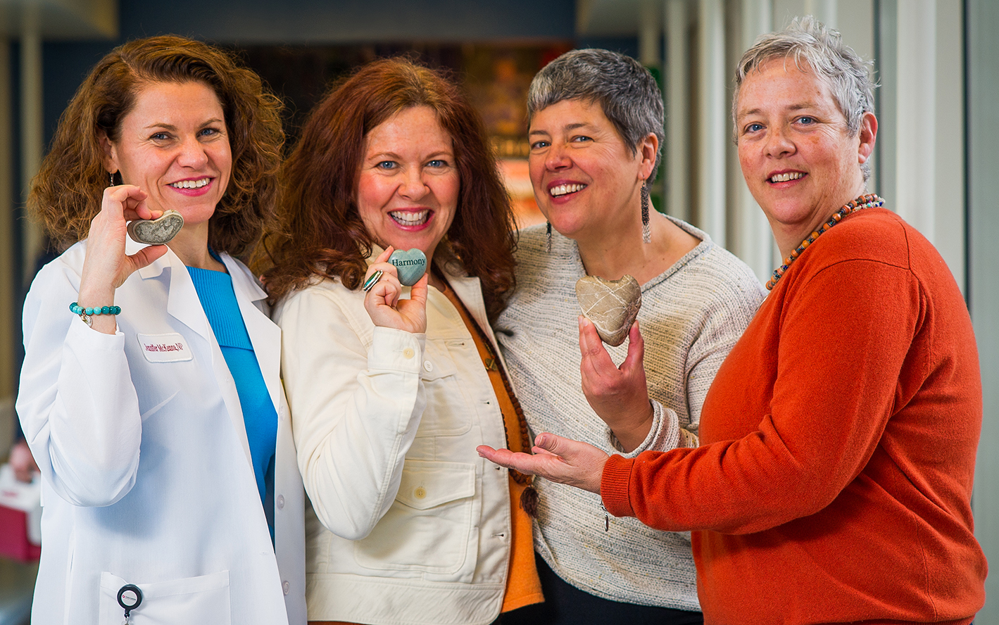 Meg McCormick, far right, with her "rocks:" Her nurse Jennifer McKenna, her sister Maura, and her wife Carla.