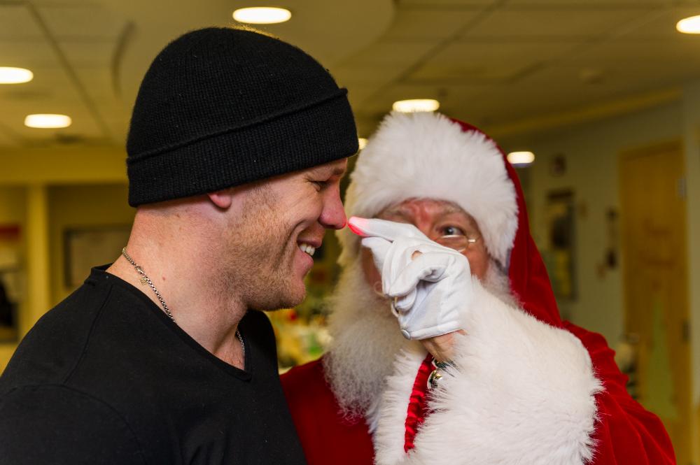 One of the many holiday visits to Dana-Farber: Back in 2013, former Boston Bruins star Shawn Thornton joined Santa for a visit at the Jimmy Fund Clinic. 