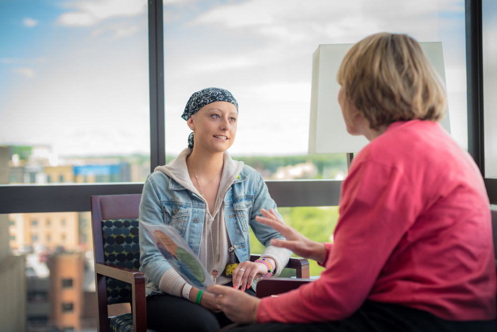 Palliative care clinicians meet with patients one-on-one or with their doctors.
