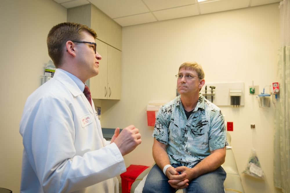 Andrew A. Lane, MD, PhD, speaks with Keith Rohleder, a patient with the rare blood cancer BPDCN. 