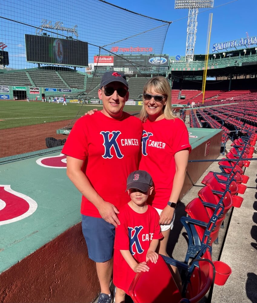 Olinski and his family at Fenway Park.