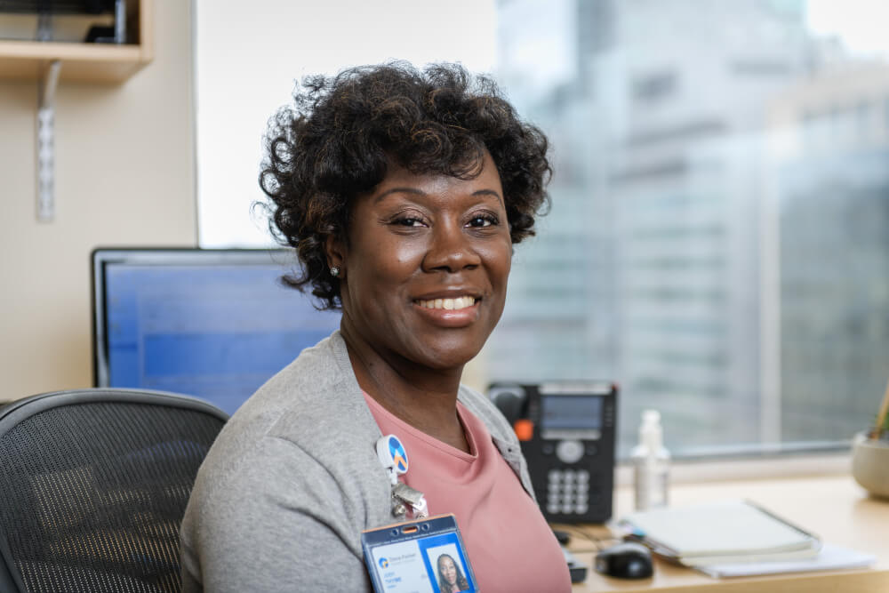 Judy Thyme is a Community Patient Navigator in Thoracic Oncology at Dana-Farber. She began the role in August 2022 as part of new Community Patient Navigator program dedicated to expanding clinical access at Dana-Farber for historically marginalized patients. The objective of the program is to  proactively engage with patients from historically marginalized communities at the point of cancer detection, and eliminate barriers to timely care throughout the cancer continuum including survivorship and end-of-life care. 