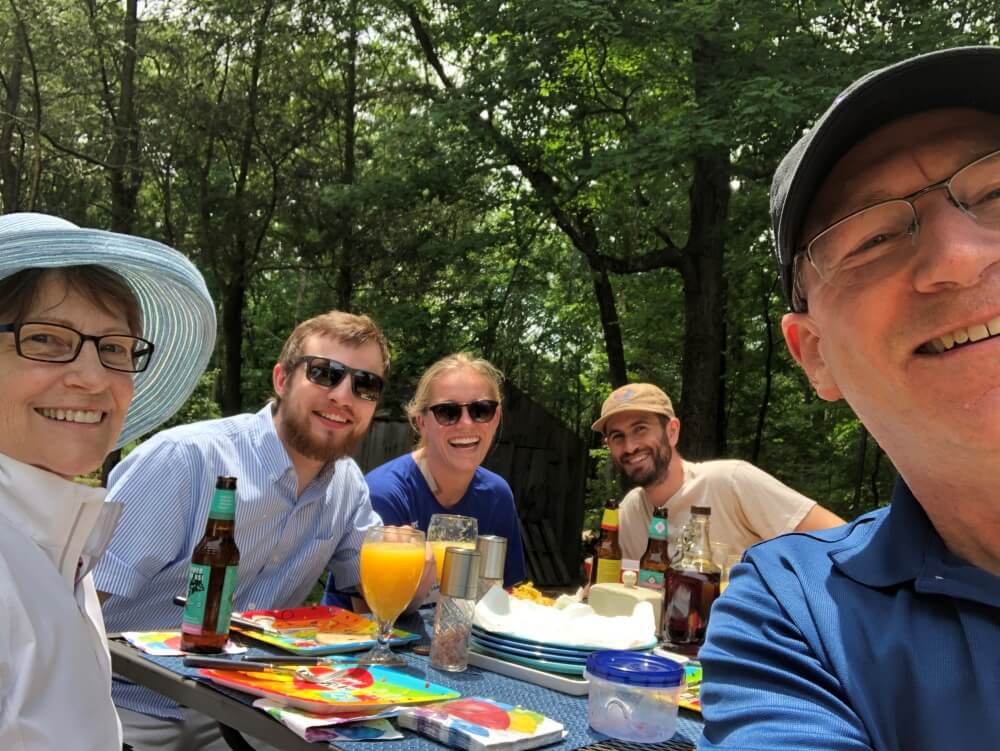 Cari Carpenter (far left) celebrated her birthday and successful CAR T-cell outpatient therapy in June 2022 with (L-R) her son Thomas, her daughter, Maddy, Maddy's Fiancé Seth, and Cari's husband Wayne. 