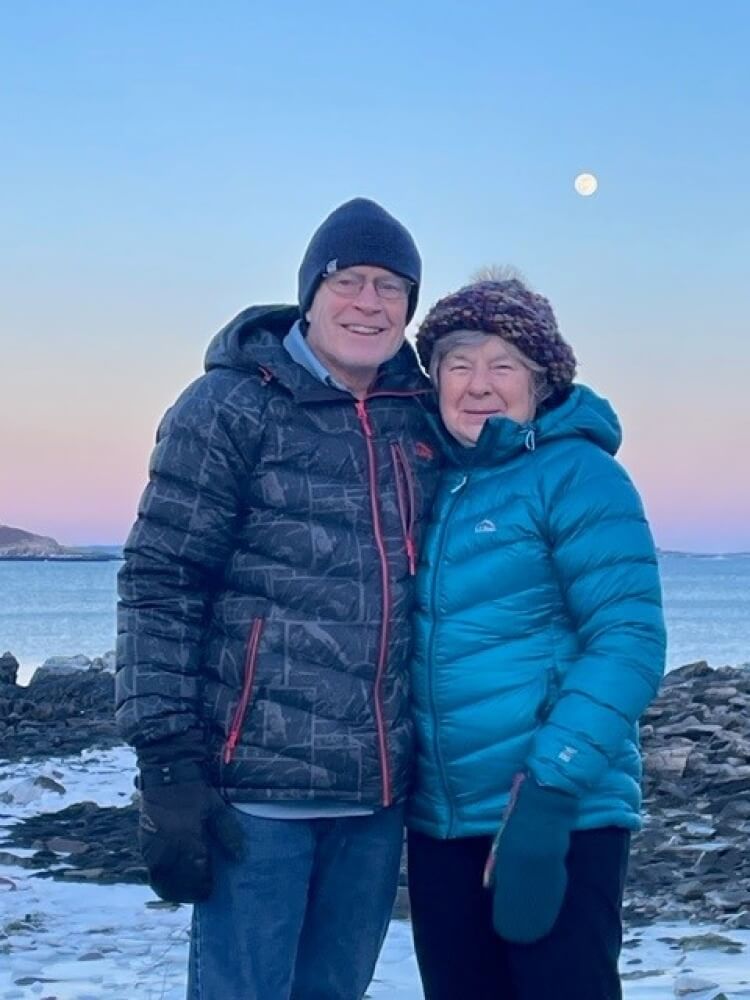 Mills and her husband Arthur "Buck" Benedict on their beloved Peaks Island, Maine, Feb. 2023.