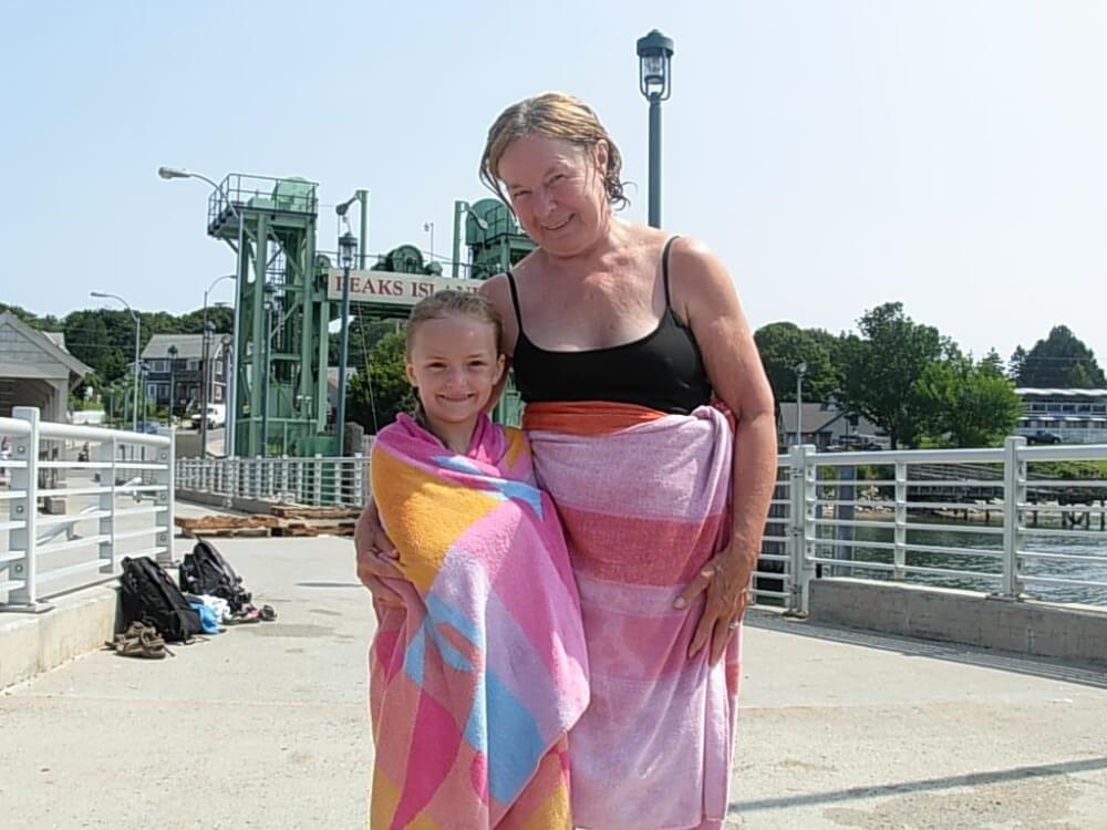 Mills (left) enjoyed one of her favorite Peaks Island passions, swimming, with her family in 2012 — the year of her first breast cancer diagnosis. 