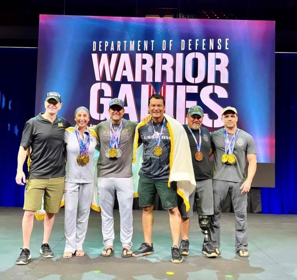 Ball (second from left) with other medal-winning swimmers at the 2022 Warrior Games.