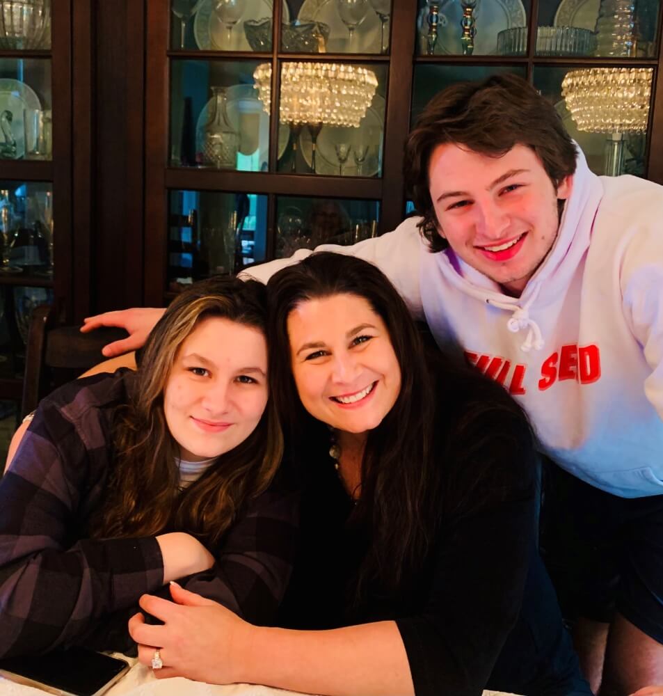 Since her diagnosis, Jenn Thorn (center), pictured with her son and daughter, has learned the importance of focusing on joy, humor, and family even when her cancer journey is challenging.  