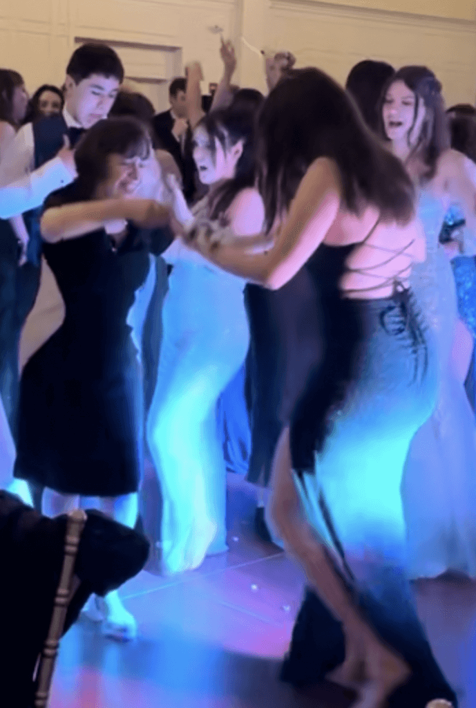 Sandra Noack, dancing with her students at the Junior Prom in 2024.