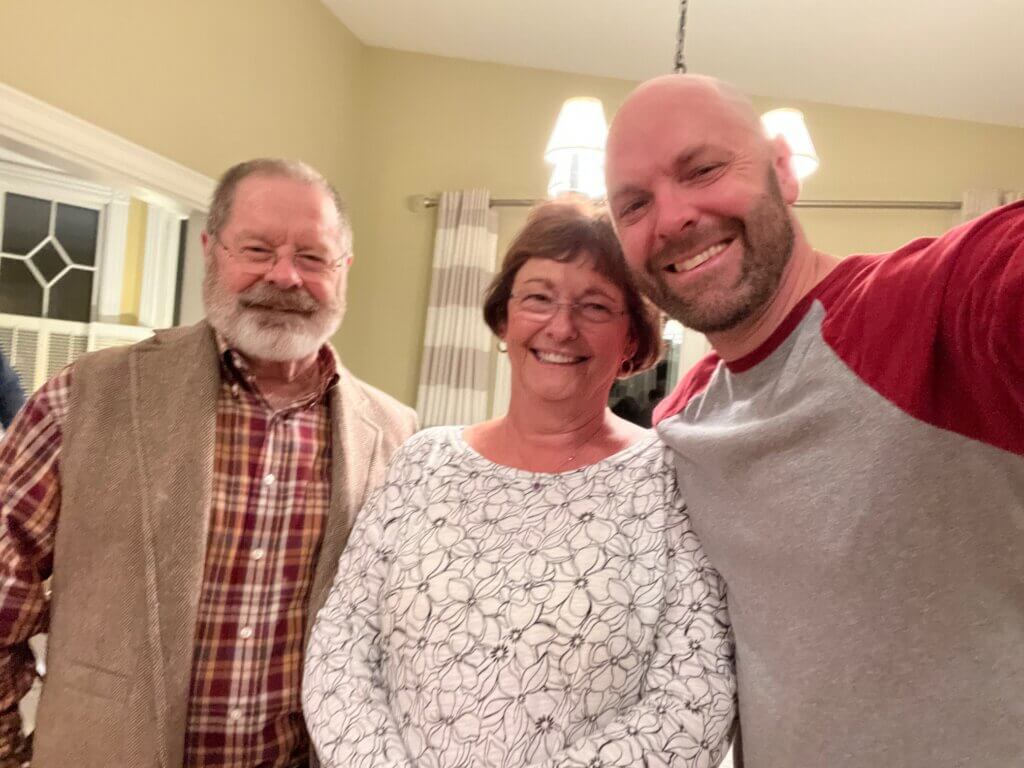 Scott Reese (right) with his parents Jay and Gayle.