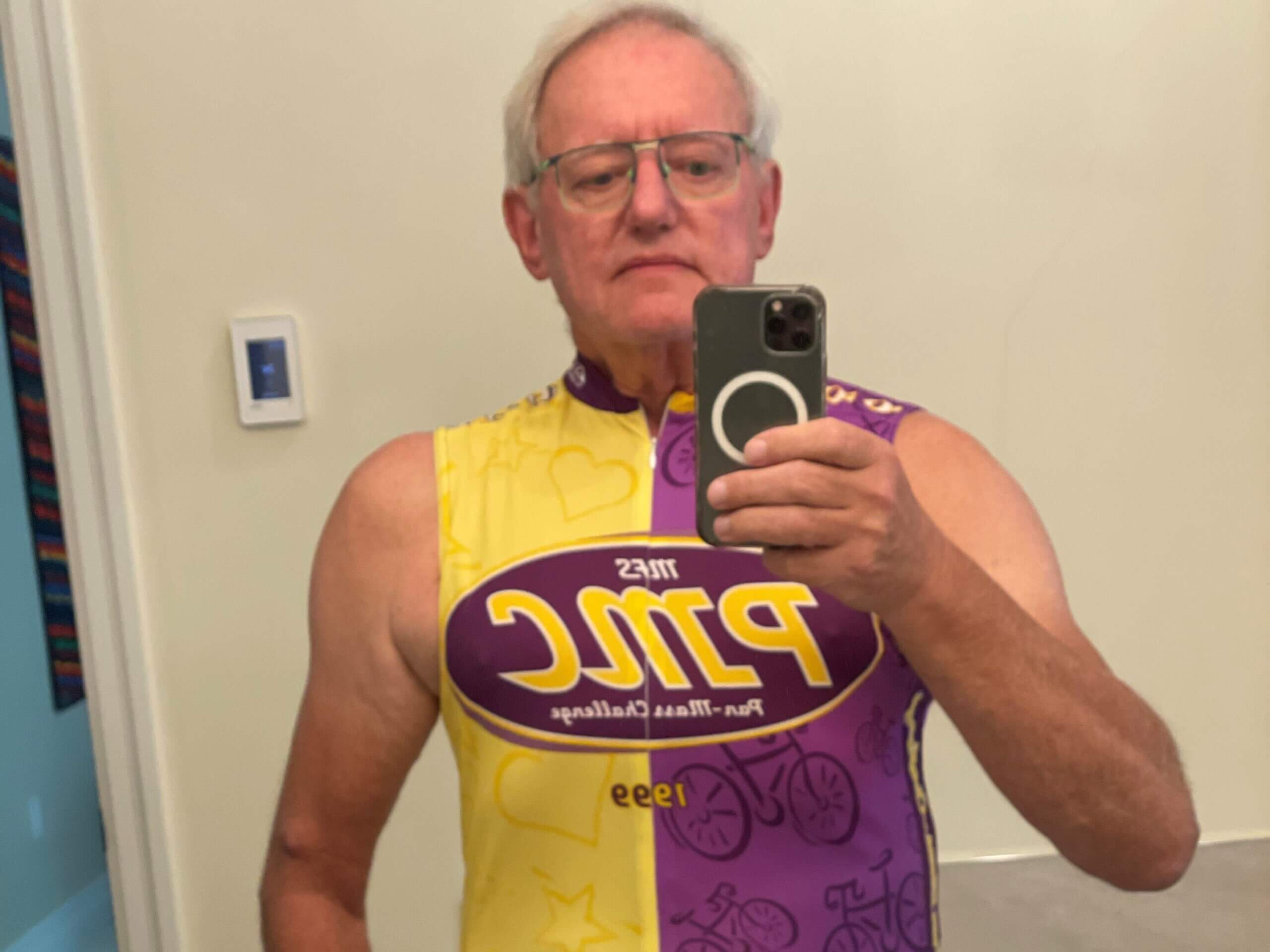 Andrew Combes in his PMC jersey from 1999. He sent this photo to Dana-Farber ahead of his visit to show the tumor located above his right elbow. 